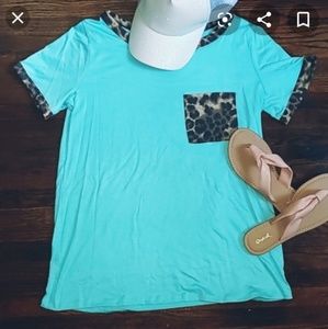 Turquoise tee size small.